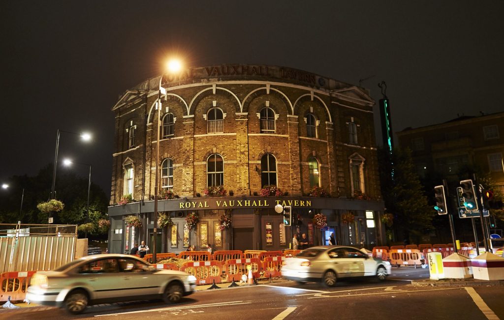 The Royal Vauxhall Tavern, cars running by it