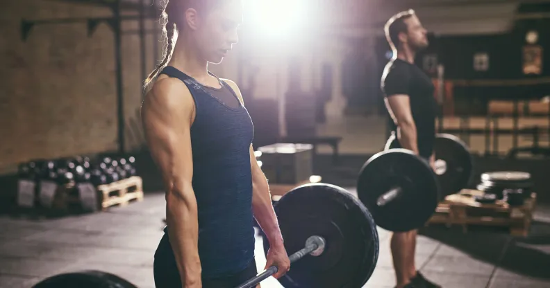 A woman showed she can deadlift more than her boyfriend, and his bruised toxic masculinity lashed out in the worst way. (Stock photograph via Elements Envato)