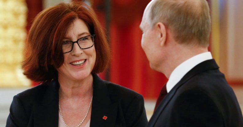 Russian President Vladimir Putin speaks to Canadian Ambassador to Russia Alison LeClaire