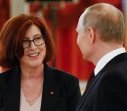 Russian President Vladimir Putin speaks to Canadian Ambassador to Russia Alison LeClaire