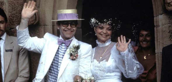 Elton John and Renate Blauel. (Patrick Riviere/Getty Images)