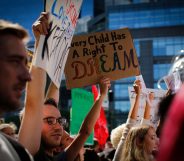 People take part during a march in protest of president Trump's decision on DACA. (Kena Betancur/VIEWpress/Corbis via Getty Images)