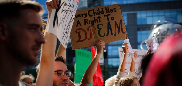 People take part during a march in protest of president Trump's decision on DACA. (Kena Betancur/VIEWpress/Corbis via Getty Images)