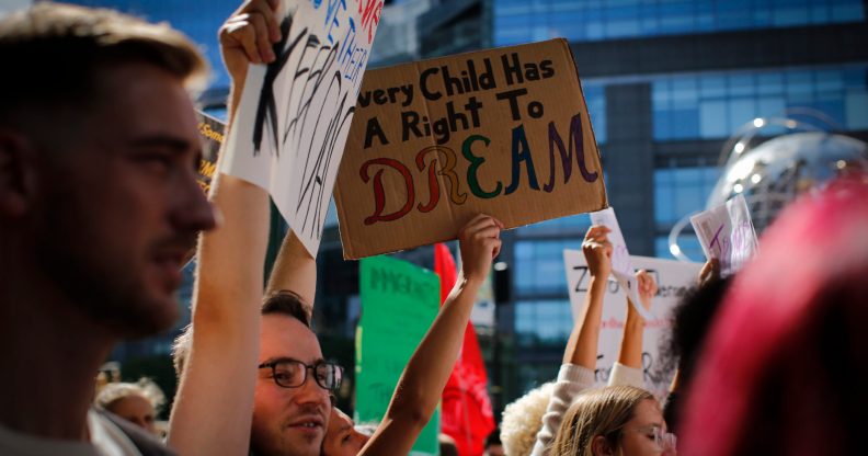 People take part during a march in protest of president Trump's decision on DACA. (Kena Betancur/VIEWpress/Corbis via Getty Images)