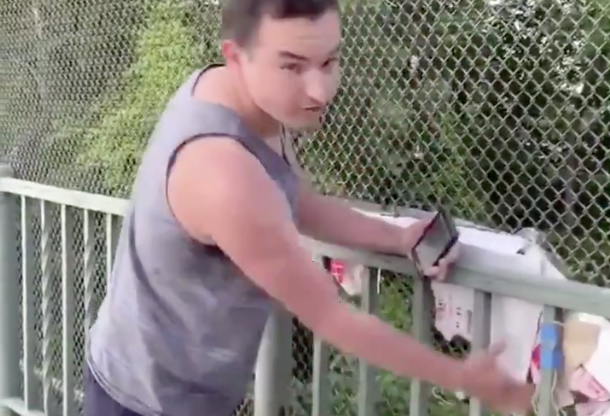 Man rips up black lives matter signs