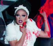 Mariah Paris Balenciaga with red paint on her hands on on her dress