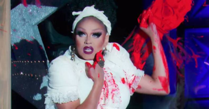 Mariah Paris Balenciaga with red paint on her hands on on her dress