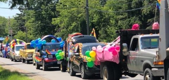 Cars packed a road in Emo, Ontario, Canada, as part of an Pride 'ambush' after town officials asked why there is no 'Straight Pride'. (Borderland Pride)