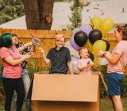 Parents throw heart-warming, belated gender reveal party for trans son