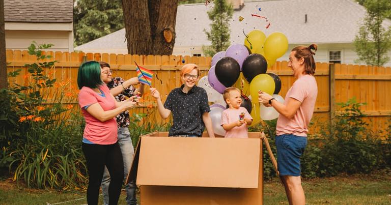 Parents throw heart-warming, belated gender reveal party for trans son