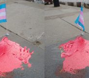 A golden imprint of JK Rowling's hands were splashed with red paint and a decorate trans Pride flag left beside it. (Supplied)