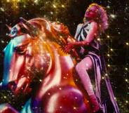 Kylie Minogue atop a bronze horse