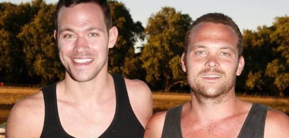 Will Young and brother Rupert wearing vests, smiling