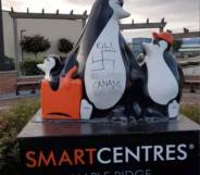 Penguin statue vandalised with vile homophobic slurs and swastikas