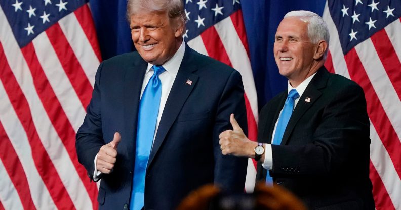 President Donald Trump and Vice President Mike Pence give a thumbs up after speaking on the first day of the Republican National Convention