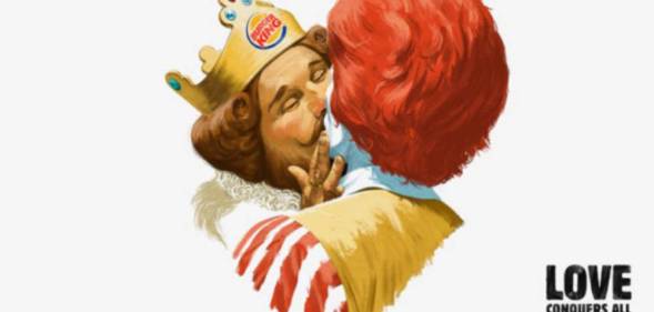 The Burger King mascot and Ronald McDonald kiss