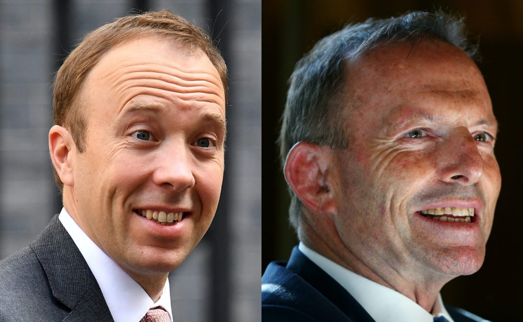 Britain's health secretary Matt Hancock (L), fresh from defending marriage equality opponent Tony Abbott, gave himself a pat on the back for voting for same-sex marriage. (Getty)