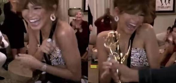 Zendaya holding Emmy Award
