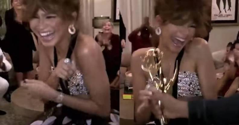 Zendaya holding Emmy Award