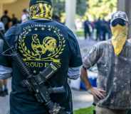 Armed members of the far-right Proud Boys group. (Nathan Howard/Getty Images)