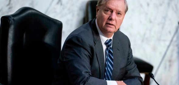 Senate Judiciary Committee Chairman Lindsey Graham questions President Donald Trumps Supreme Court nominee Judge Amy Coney Barrett during the third day of her confirmation hearing before the Senate Judiciary Committee on Capitol Hill on October 14, 2020