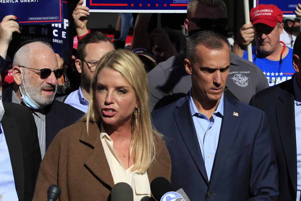 Former Florida Attorney General Pam Bondi, with Trump campaign adviser Corey Lewandowski (C R). (KENA BETANCUR/AFP via Getty Images)