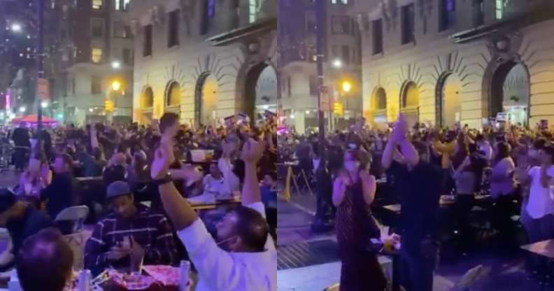Hundreds of people packed a Philadelphia gay bar to celebrate Joe Biden winning the presidential race. (Screen captures via Twitter)