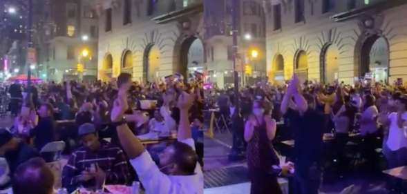 Hundreds of people packed a Philadelphia gay bar to celebrate Joe Biden winning the presidential race. (Screen captures via Twitter)