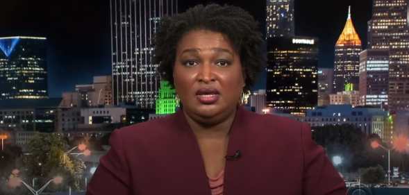 Democratic firebrand Stacey Abrams has celebrated the end of "orange menace" Donald Trump