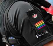 A Met police officer wearing rainbow epaulettes at Pride in London