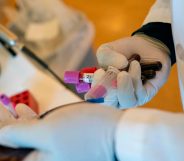 A phlebotomist takes blood donation samples