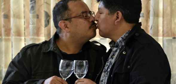 David Aruquipa kisses Guido Montano after Bolivia recognised their same-sex civil union