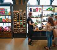 People wearing protective face masks shop in Lush in Bournemouth in June2020