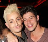 Zach Rance and Frankie J Grande pose together, Rance's arm around Grande