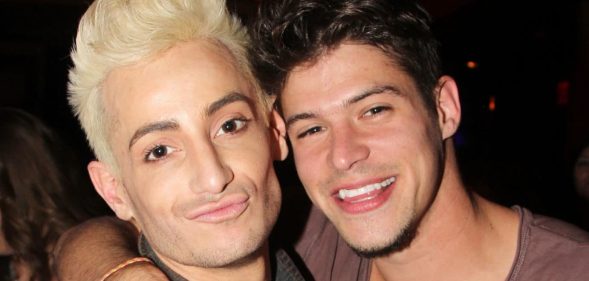 Zach Rance and Frankie J Grande pose together, Rance's arm around Grande