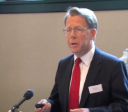 Kenneth Ferguson speaking at a lecturn