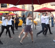 Mark in a flash mob proposal to Yuval