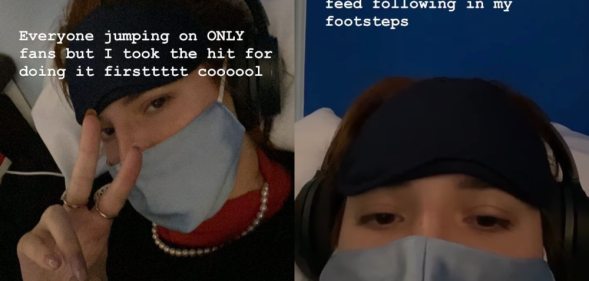 Bella Thorne wearing a face mask and headphones poses to the camera