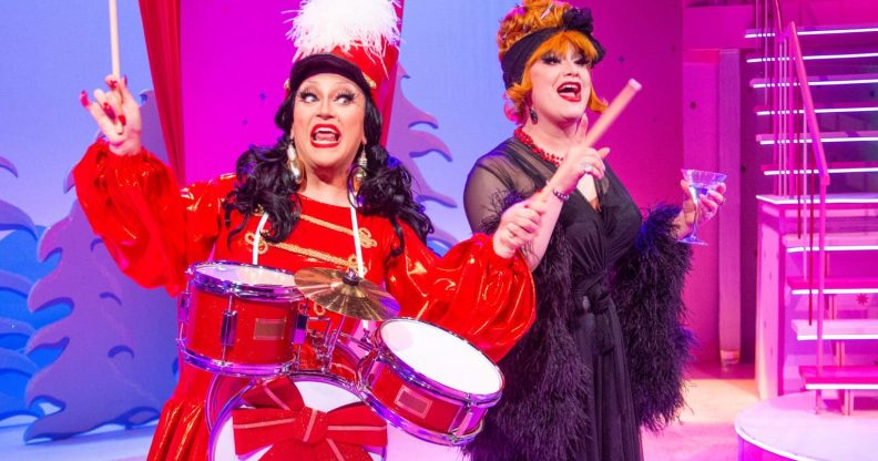 BenDeLaCreme dressed as a drummer with Jinkx Monsoon in a feather-trimmed nightgown