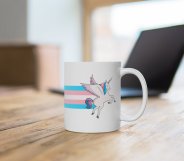 The trans flag unicorn rainbow mug available from the PinkNews store