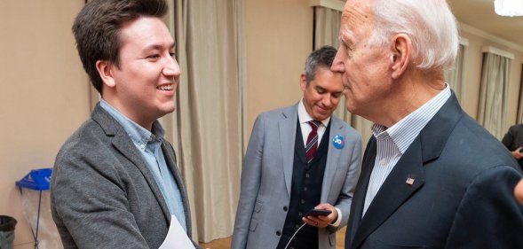 Joe Biden shakes hands with his gay platform manager Brendan Cohen.