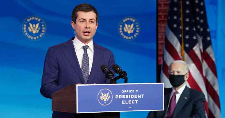 Former Democratic presidential candidate Pete Buttigieg speaks as US President-elect Joe Biden looks on after he was nominated to be Secretary of Transportation