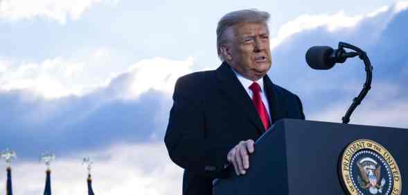 President Donald Trump speaks to supporters at Joint Base Andrews before boarding Air Force One for his last time as President.