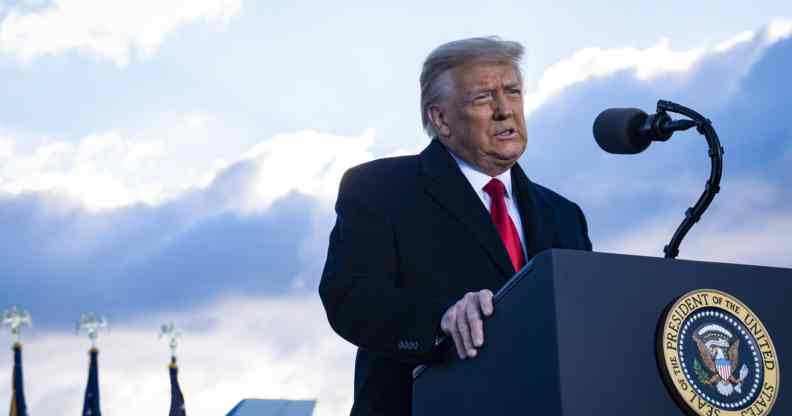 President Donald Trump speaks to supporters at Joint Base Andrews before boarding Air Force One for his last time as President.