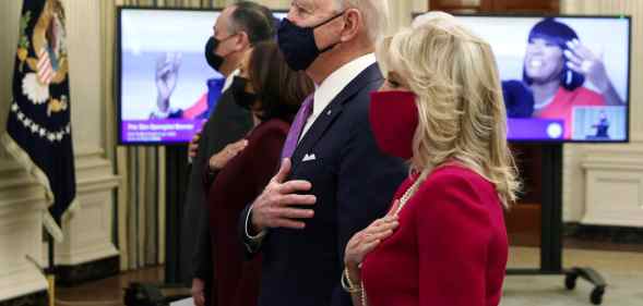 US president Joe Biden, first lady Dr Jill Biden, Vice President Kamala Harris and Second Gentleman Doug Emhoff watch the virtual presidential inaugural prayer service