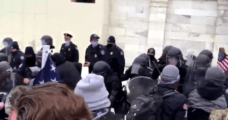 Protestors attempting to break into the Capitol.