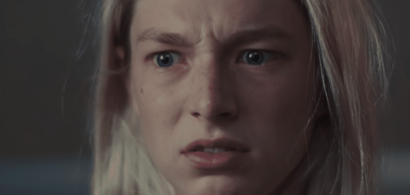 Extreme close up of a worried Jules (Hunter Schafer)