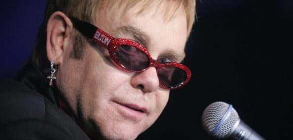 Elton John in bedazzled sunglasses