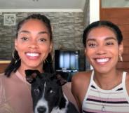 Kristen Gray and Saundra Alexander smile tot he camera with their dog