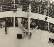 Image shows crowds about the HMT Empire Windrush